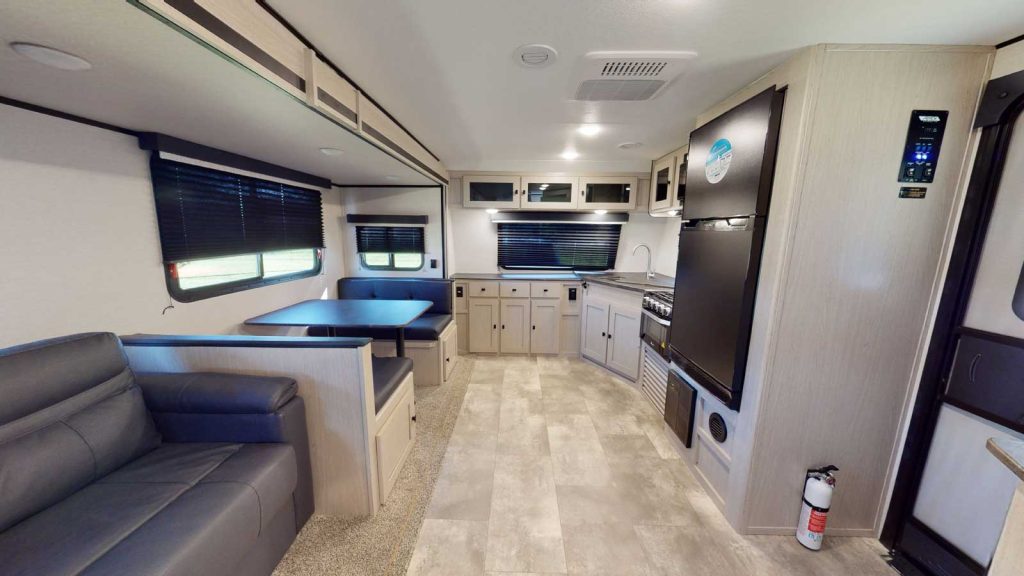 travel trailer with white kitchen