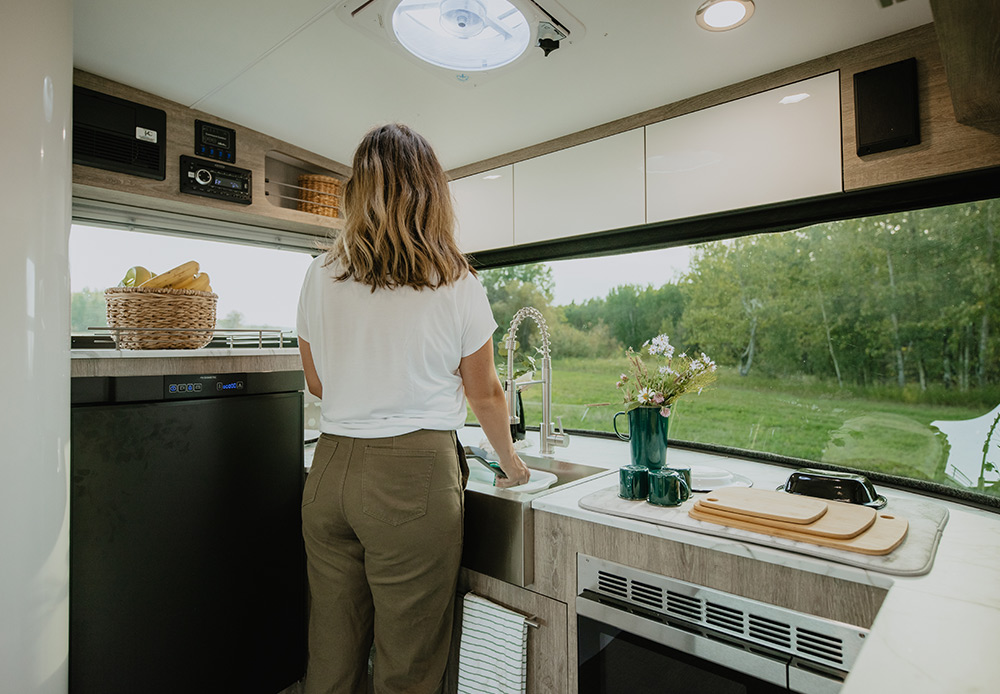 travel trailer with white kitchen